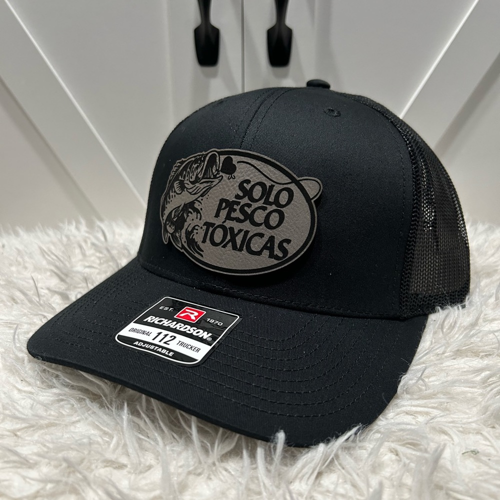 Laser engraved Solo Pesco Toxicas Richardson 112 trucker hat.
